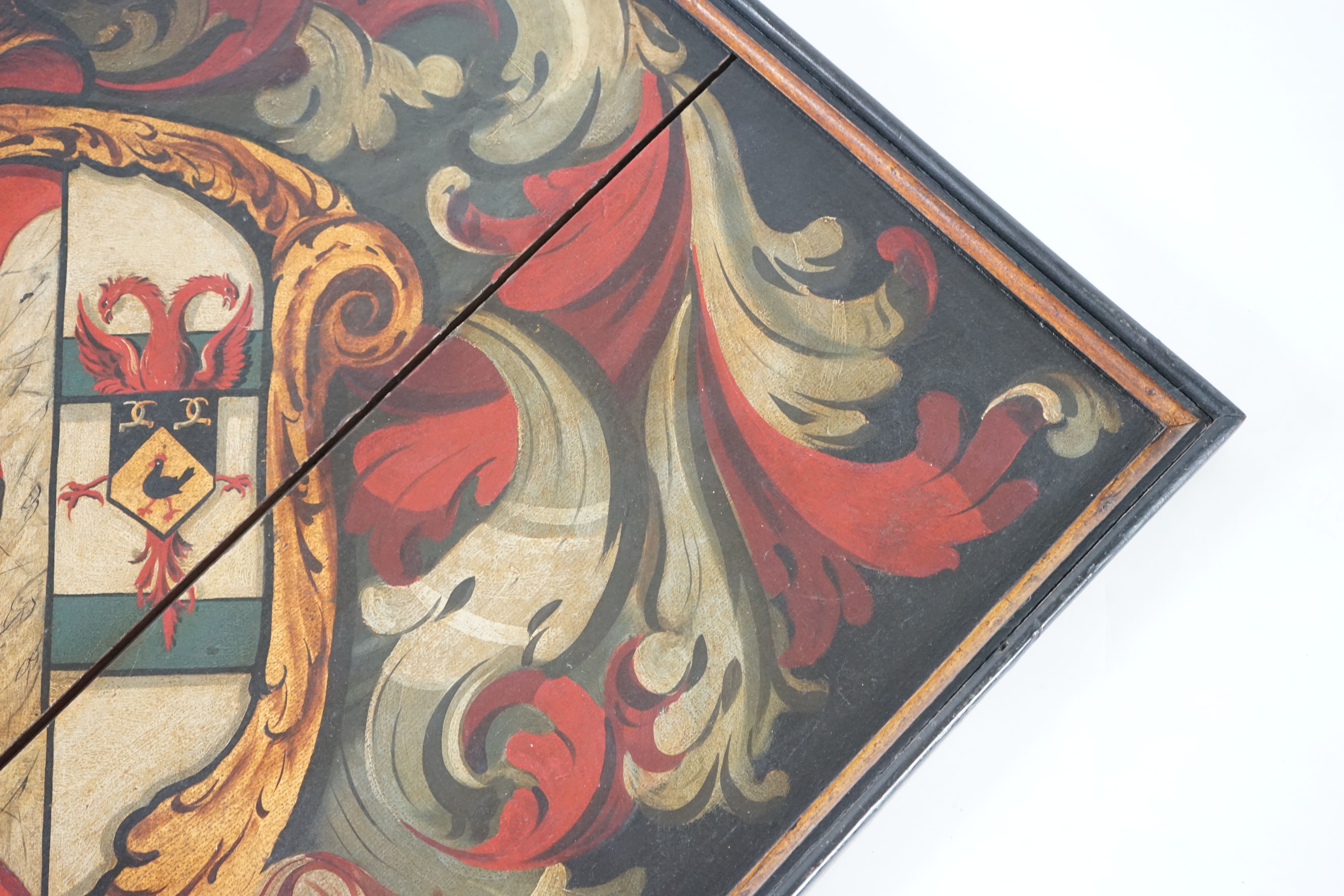 A late 18th / early 19th century oil on wooden panel hatchment